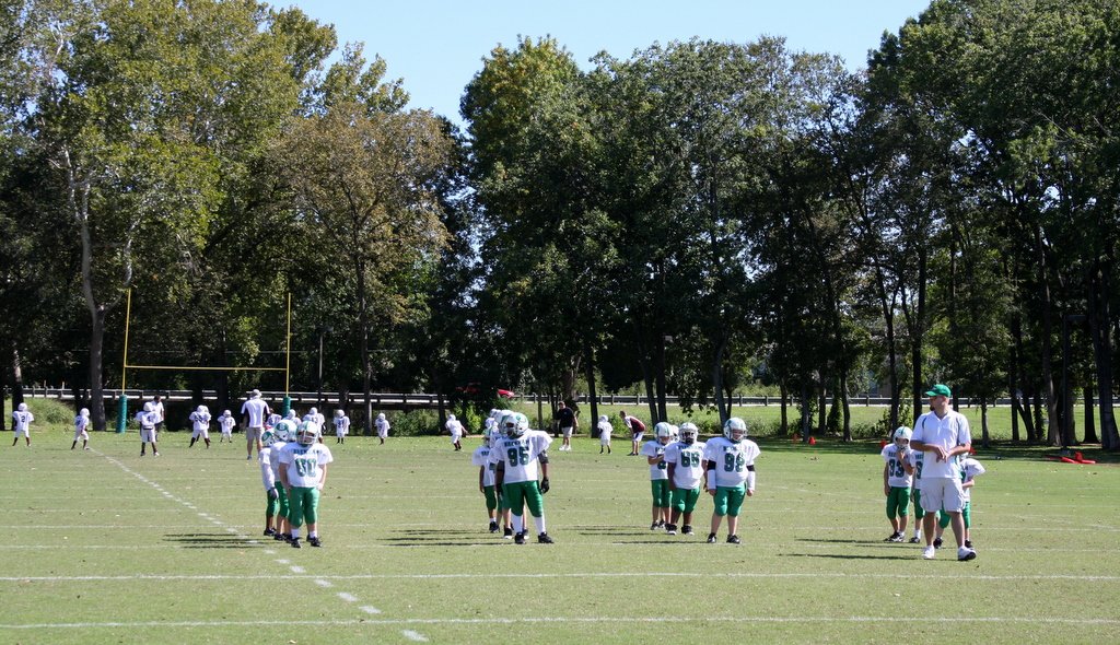 youth football team playing on hohlt park fields